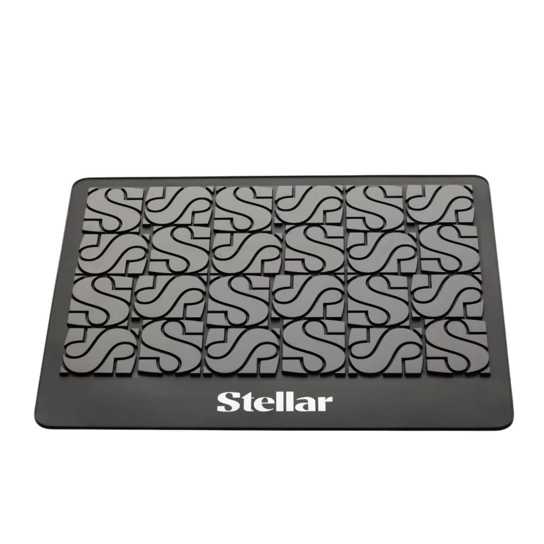 Black mat with white pattern and 'Stellar' branding on a white background
